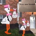 Poolesville MD Pink Stork Sign<br/> Flying Storks<br/> (301) 606-3091